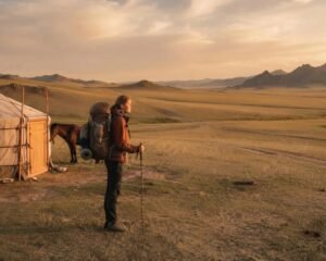 Mongolia travel tips for students — backpacker at a traditional ger on the steppe